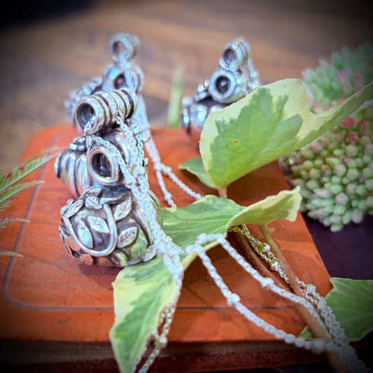 Silver pumpkin fairy necklace