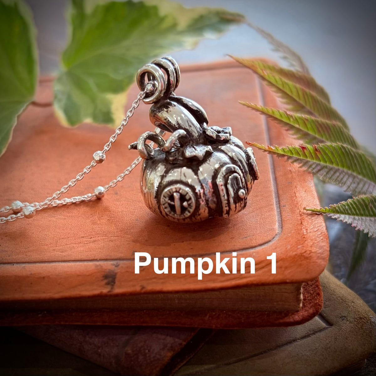 Silver pumpkin fairy necklace