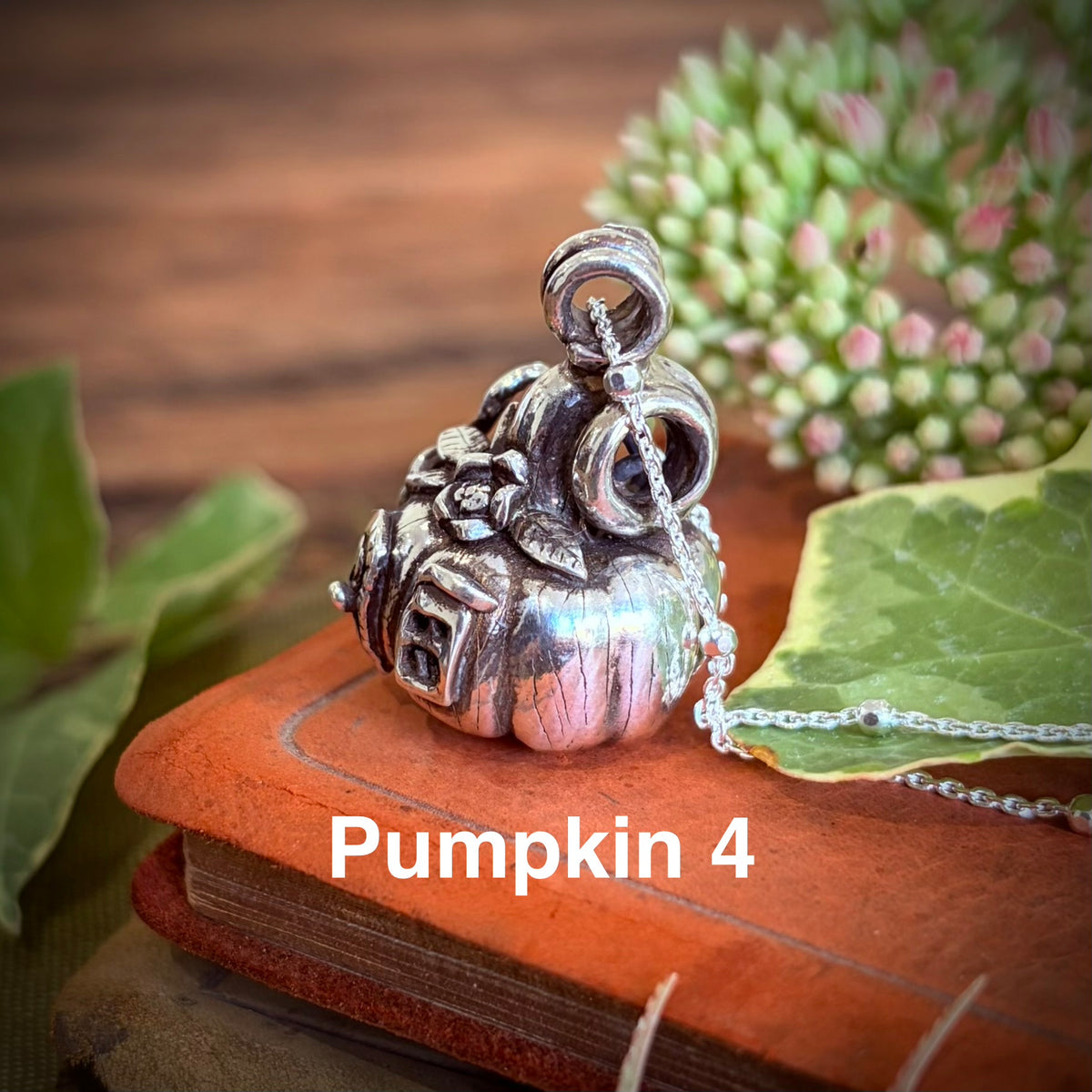 Silver pumpkin fairy necklace