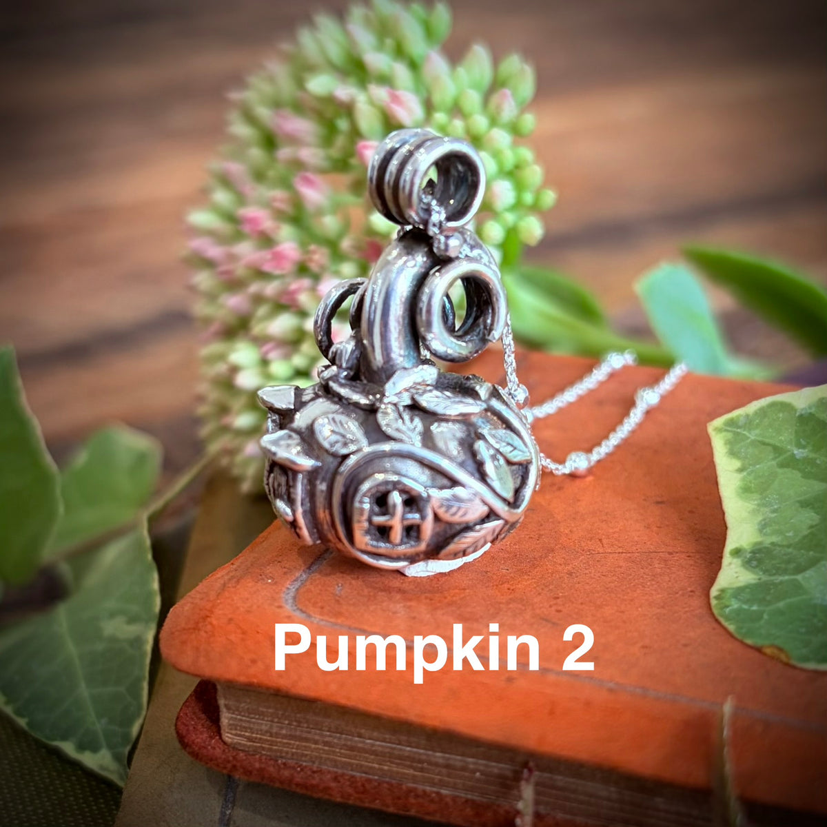 Silver pumpkin fairy necklace