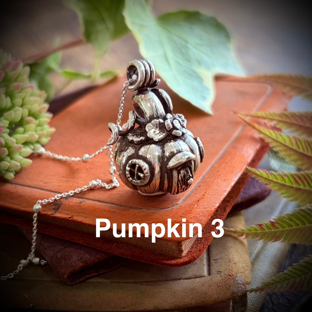Silver pumpkin fairy necklace