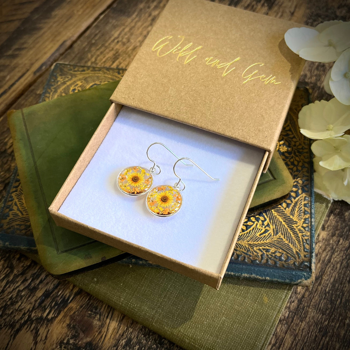 Silver sunflower earrings