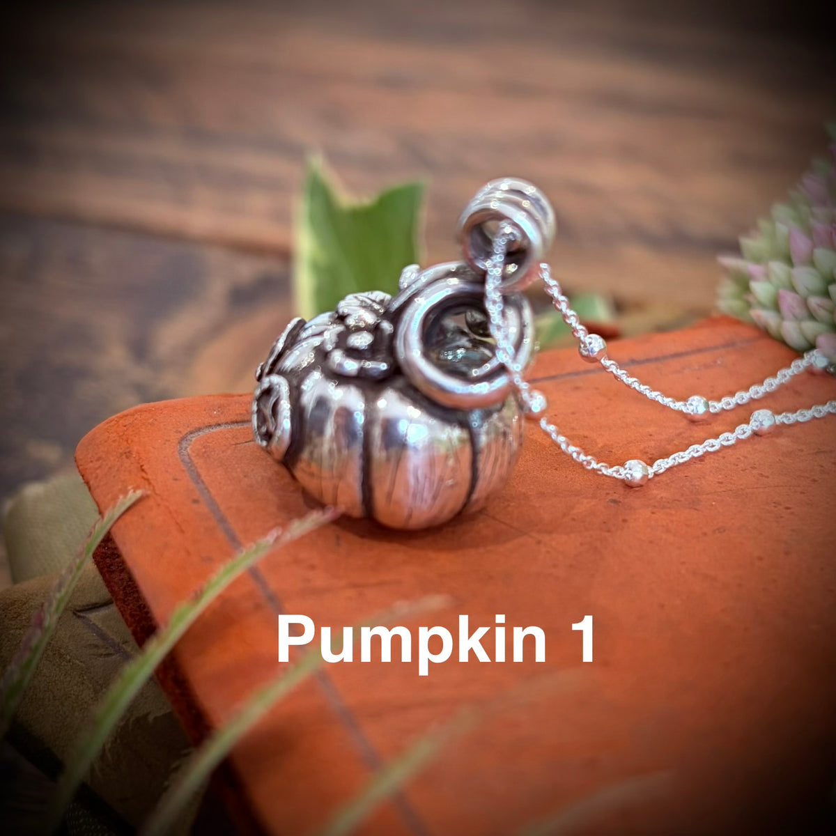 Silver pumpkin fairy necklace