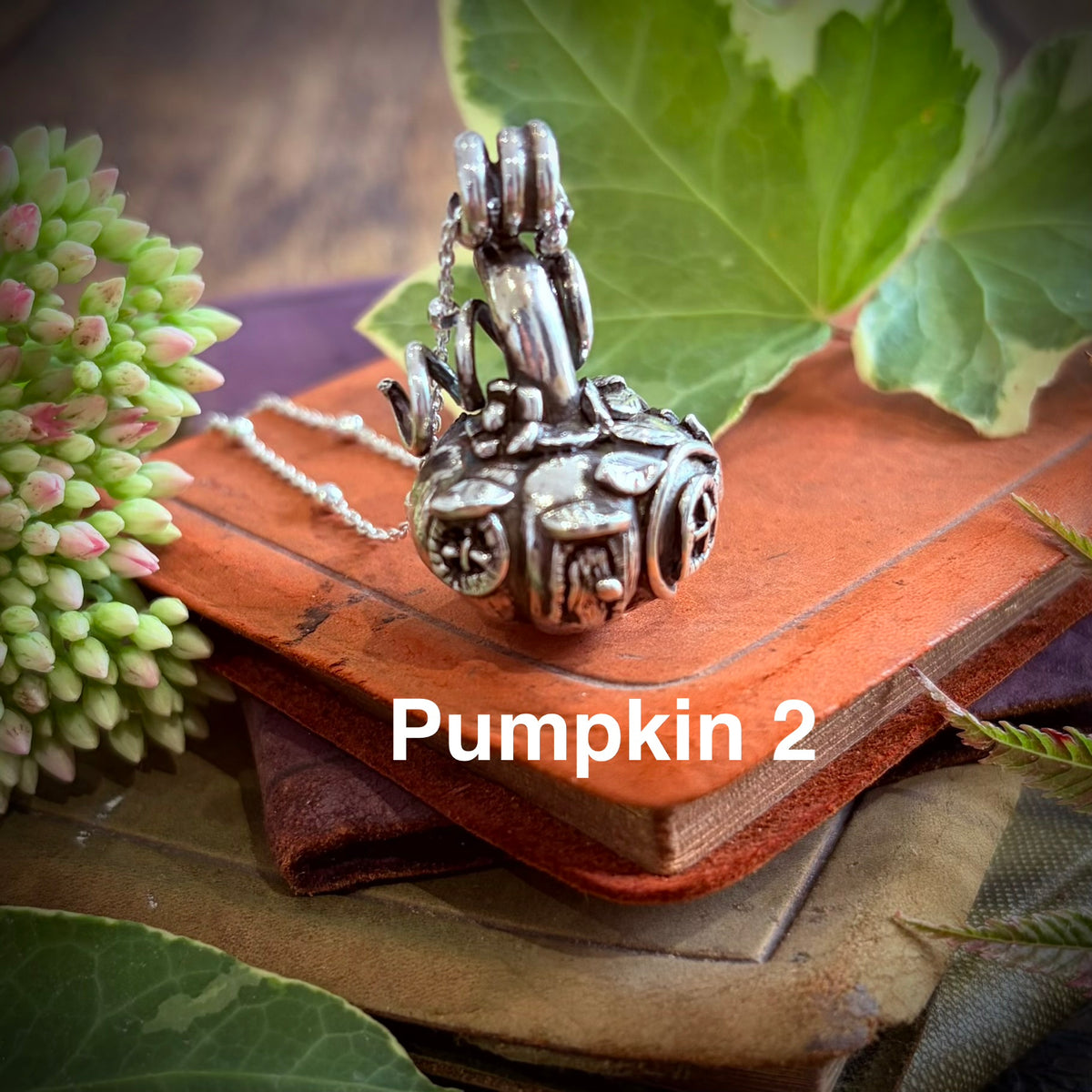 Silver pumpkin fairy necklace