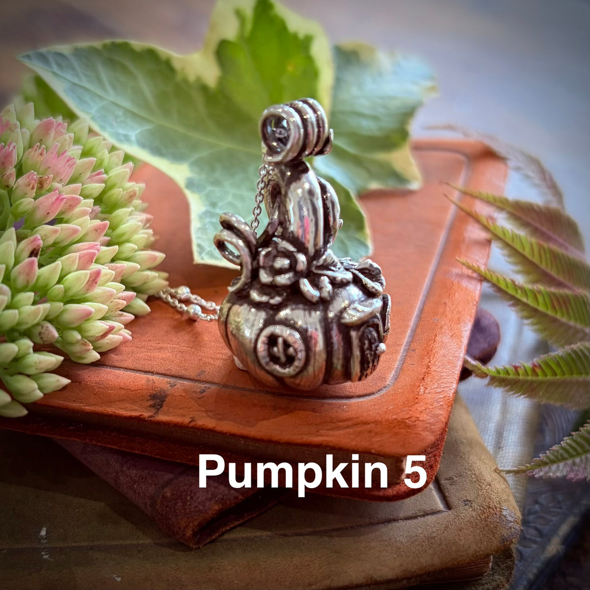 Silver pumpkin fairy necklace