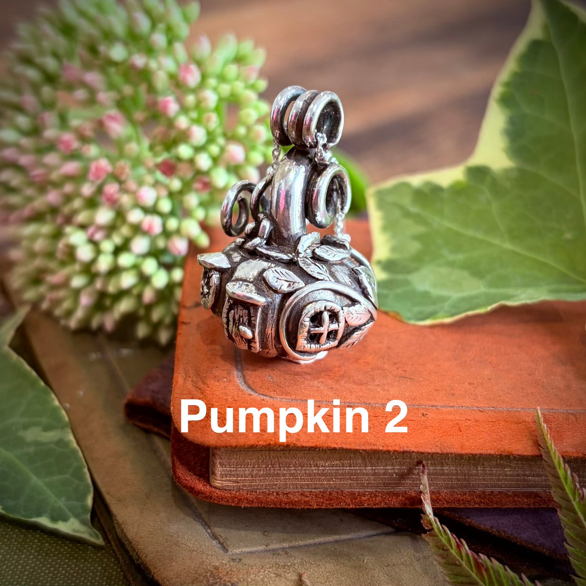 Silver pumpkin fairy necklace