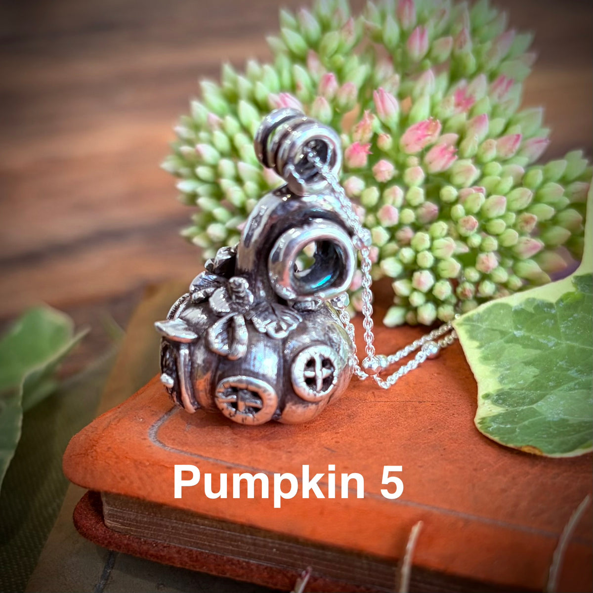 Silver pumpkin fairy necklace