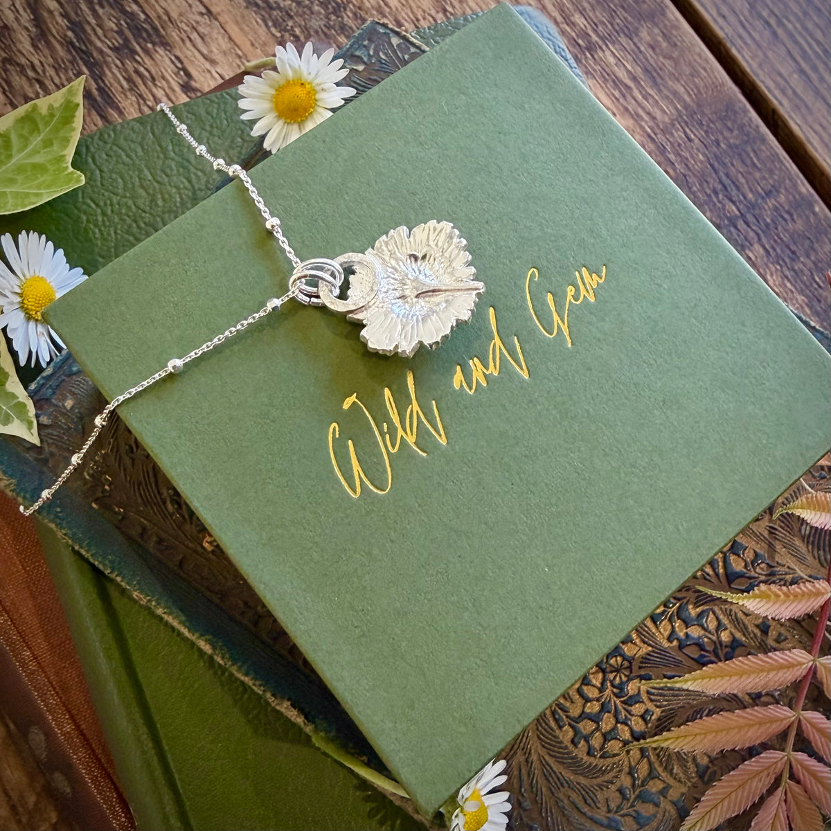 Silver and 24k gold daisy