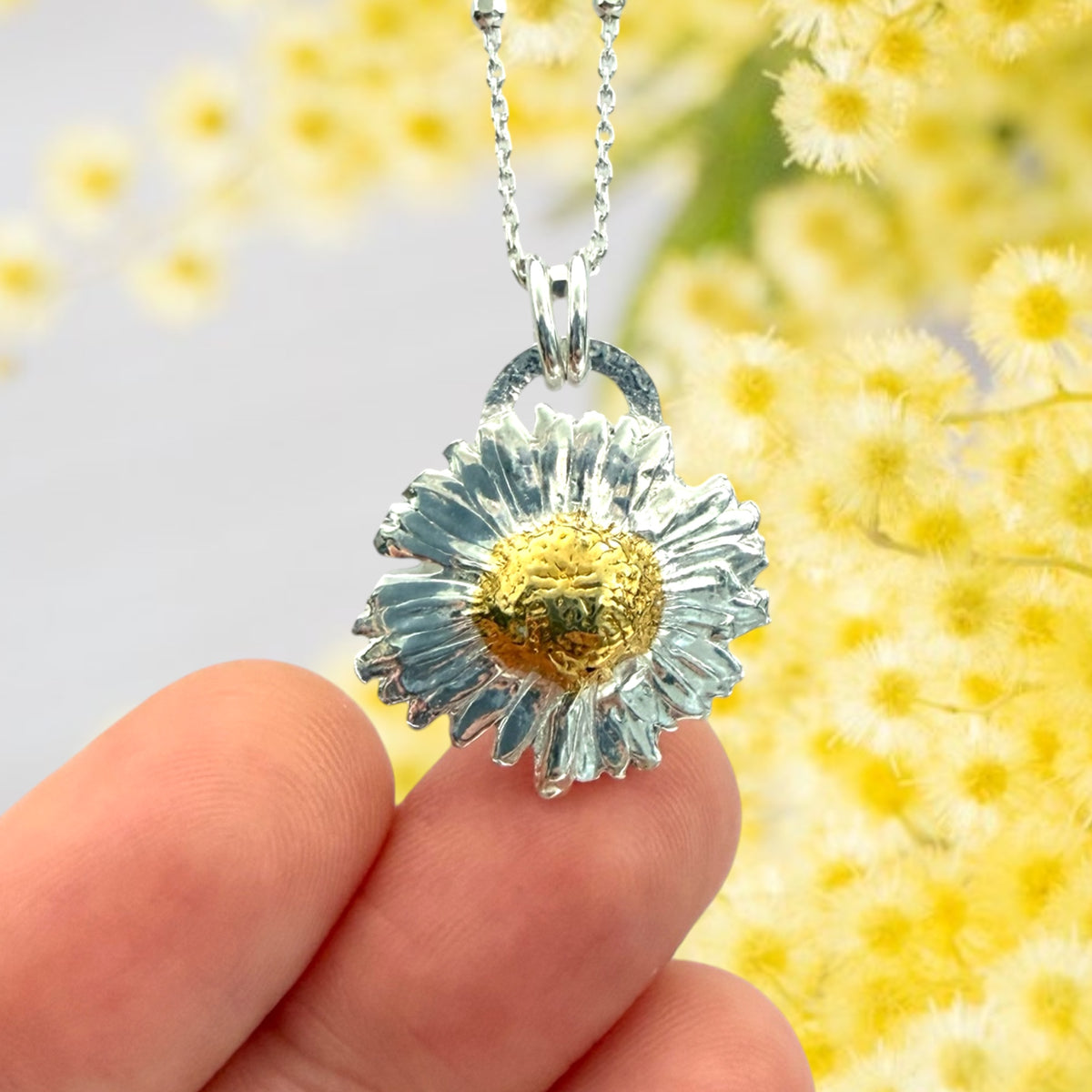Silver and 24k gold daisy