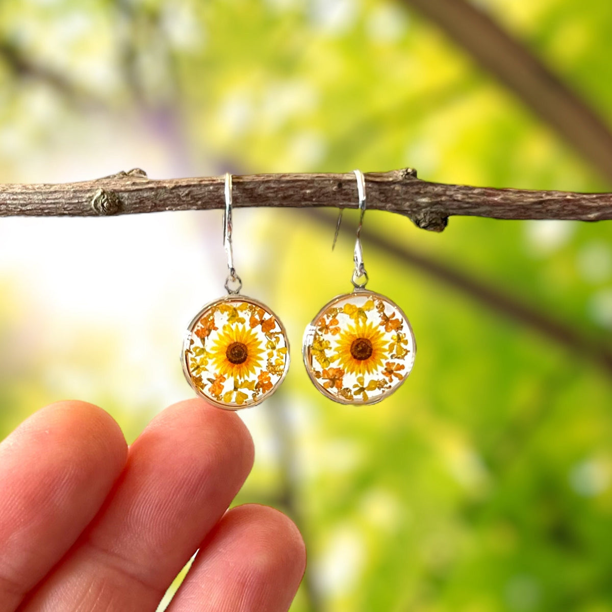 Silver sunflower earrings